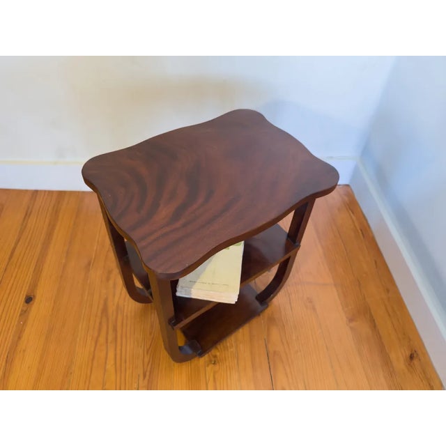 Exquisite Portuguese Art Deco side table (20th century) crafted from rich veneer. Geometric design with a single drawer...