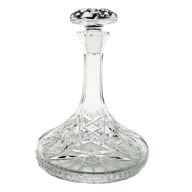 It gleams with precision—pinwheels spinning in stillness, corset-tied crosshatching tight against its flared body. This...