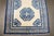 a 19th-century ivory and Blue Chinese Peking Carpet Details rug no. 10823 size 4' x 5' 9" (122 x 175 cm)