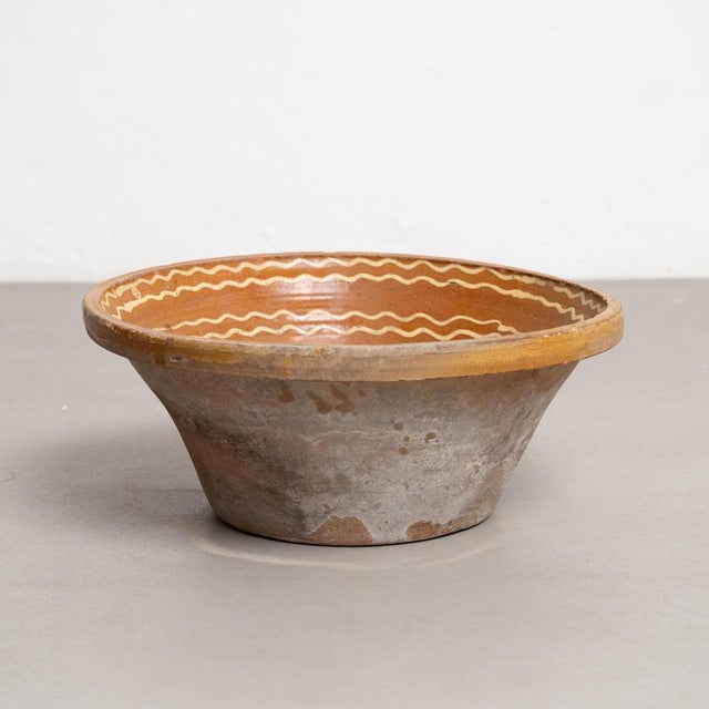 Rustic Ceramic Plate Vase with Hand-Painted Details – Early 20th Century, Circa 1940 This rustic ceramic plate vase,...