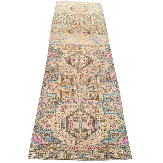 Hand-knotted with care using traditional rug-making techniques, this wool rug blends timeless craftsmanship with a modern...