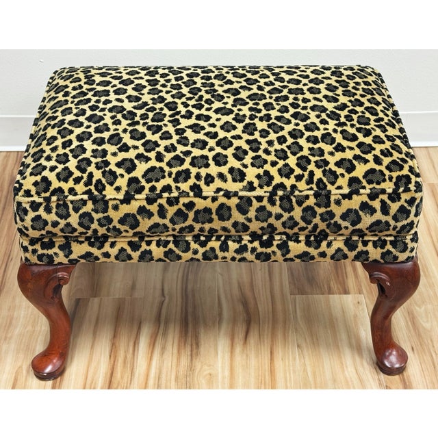 Vintage classic wood framed stool with curved legs and velvet animal print fabric. Great versatile size and a chic accent...