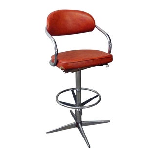 Chromcraft Mid-Century Orange Vinyl Swivel Chair For Sale