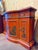 This is a striking red lacquer console cabinet by Karges, created in the unmistakable Dorothy Draper style. The gently...
