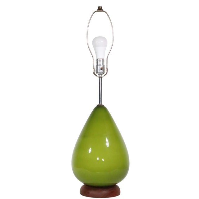 Chic mid century green glass with original pierced paper shade. The lamp is in excellent, original, clean and working...