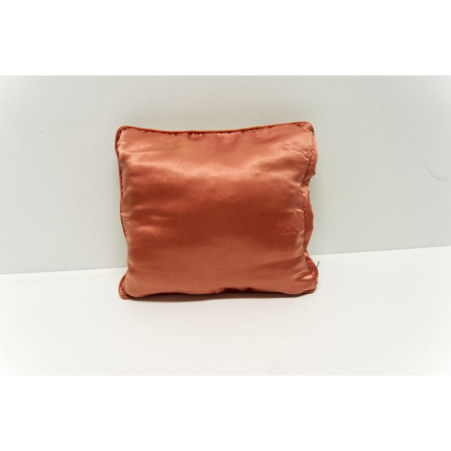 Early 20th century Chinese embroidered silk decorative pillow with blooming flowers and butterfly motif.