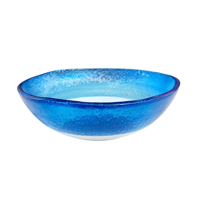 This exceptional hand made Middle Eastern blue glass bowl features a glazed good luck eye at its center, a timeless symbol...