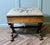Early Victorian Sewing Box, X Frame Embroidered Foot Stool This is a Victorian piece, it is made in walnut and is covered...