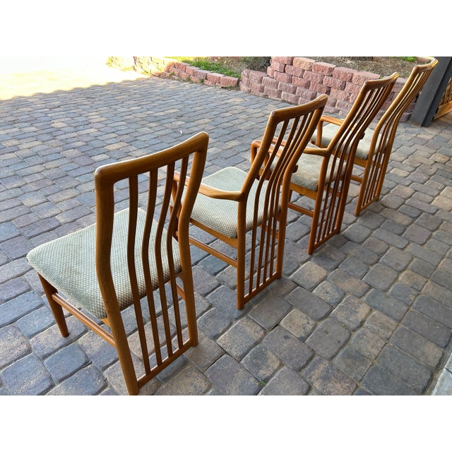 Set of 4 Kai Kristiansen Danish dining chairs from the 1960s. This mid-century modern set includes 2 armchairs and 2 side...