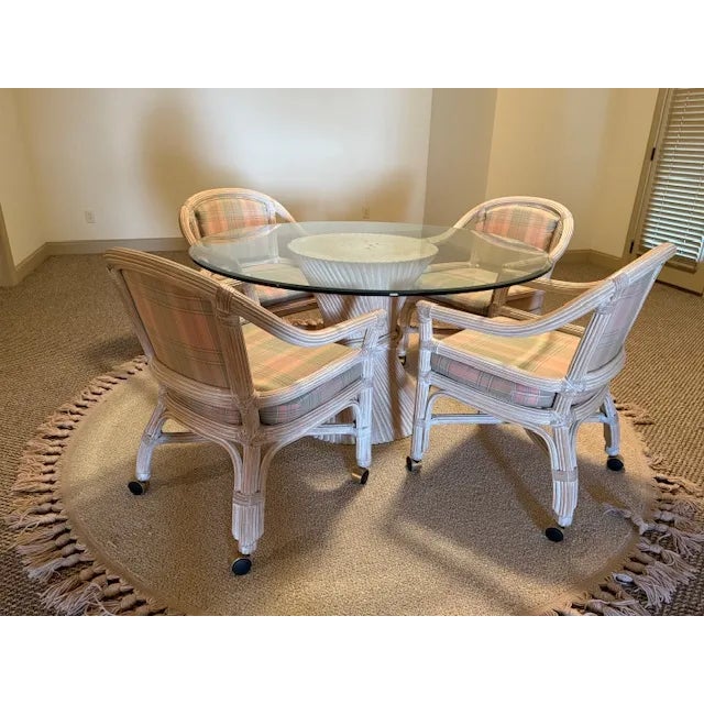Fantastic vintage WHEAT SHEAF dining/breakfast table with four simulated BAMBOO chairs on rollers! This set is attributed...