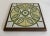 Gorgeous green, white and yellow tile trivet that was made in Italy. The tile is framed in wood. Great piece for warming...