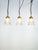 Early 20th century diminutive art deco pendant lights with beautiful minimalistic two tone design and brass galleries. Up...