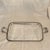 Heavy quadruple silver plate Manning-Bowman & Company raised handle serving tray with monogrammed in the center. The...