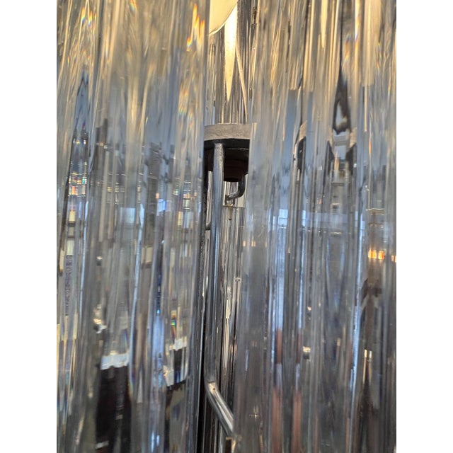 Spectacular Italian chandelier in Murano glass, composed of a multitude of long, cascading, prismatic crystal glass rods...