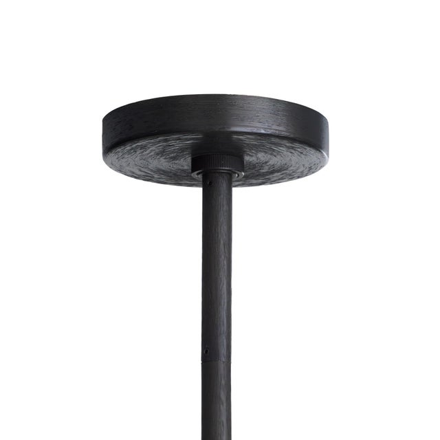 Our astronomy-influenced flush mount features a constellation of can lights centered by white alabaster. The frame of...