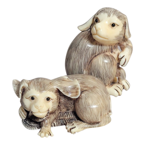 Pair of Carved Faux Ivory Dog Netsuke-Style Miniatures