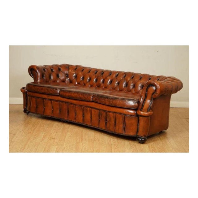 One of a kind restored hand-dyed whiskey brown serpentine club leather sofa. This is a solid and very good quality sofa,...