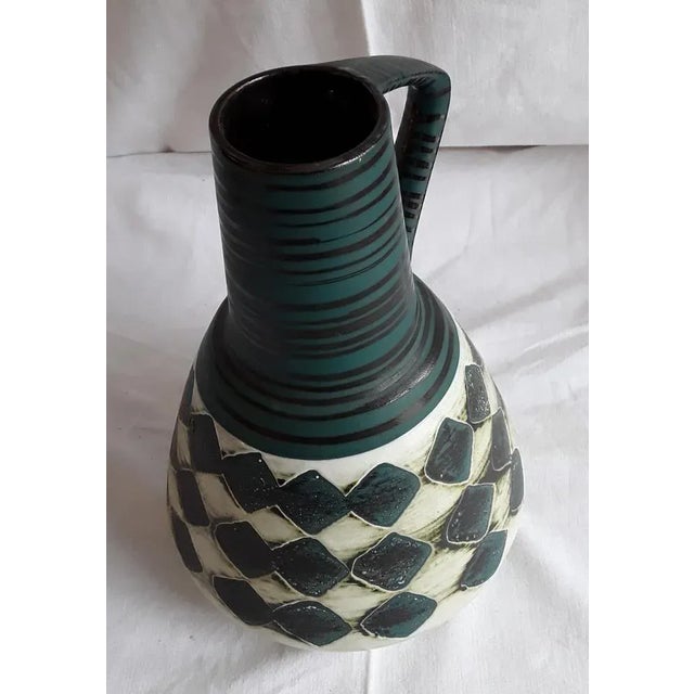 Vintage German Ceramic Mug with White or Black Decor, 1960s, in Very Good conditions. Designed 1960 to 1969 This piece has...