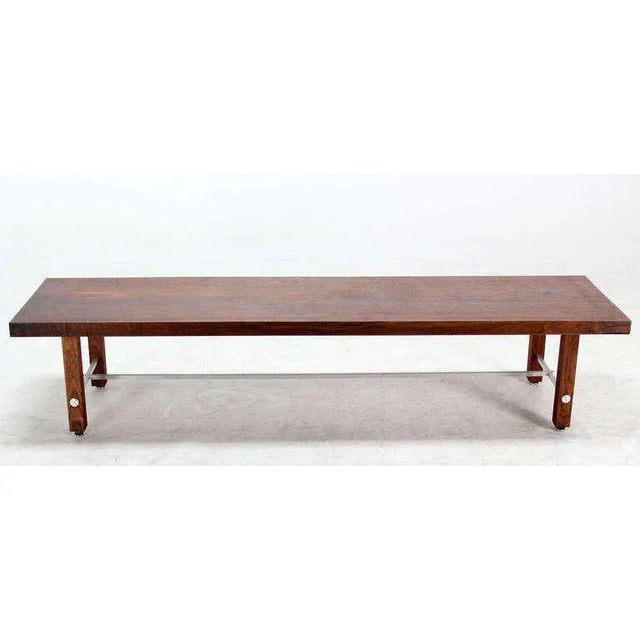 Very nice mid-century modern long board coffee table. Solid walnut top and legs.