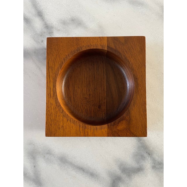 A vintage modernist style scoop bowl by Duk-It Mcdonald Products Corp, crafted of genuine American walnut.
