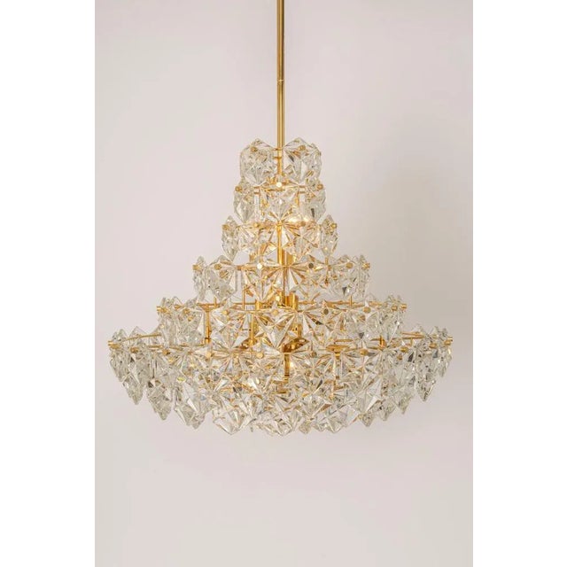 A stunning ten-tier chandelier by kinkeldey, germany, manufactured circa 1970-1979. A handmade and high quality piece. The...
