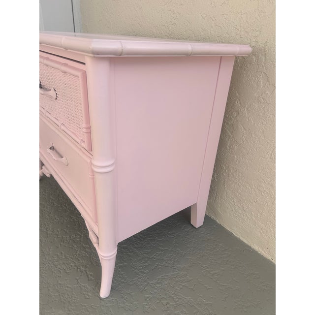 Stanley Furniture Company this is a faux bamboo newly finished in pink very clean quality built furniture