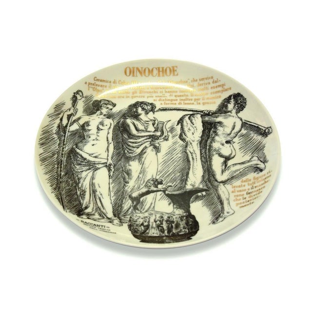 This Oinochoe is an elegant silk-screened porcelain plate, designed by Piero Fornasetti for Martini & Rossi in 1960s. In...