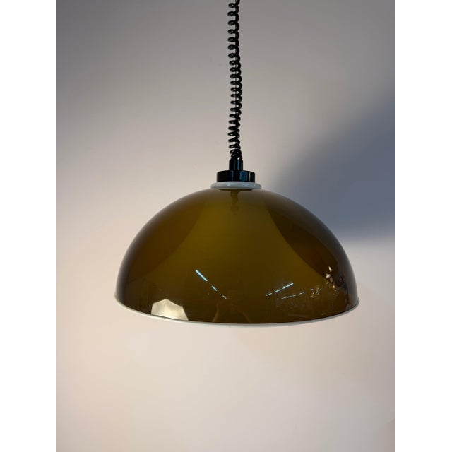 A highlight of the 70s: This Space Age pendant lamp, crafted from brown and white acrylic glass, is the work of master...