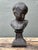 This charming vintage cast bronze bust captures the timeless innocence and softness of childhood through classical...