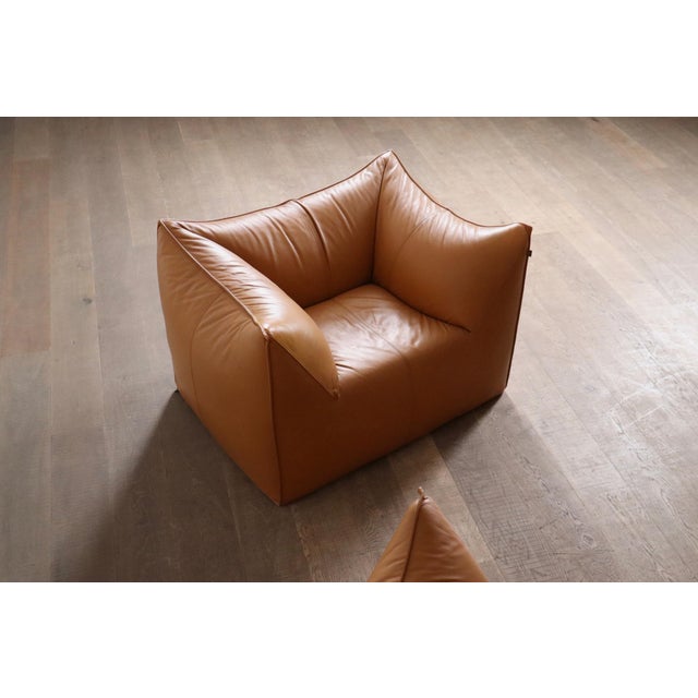 Beautiful le bambole sofa and lounge chair in original cognac leather upholstery, designed by mario bellini for b&b italia...