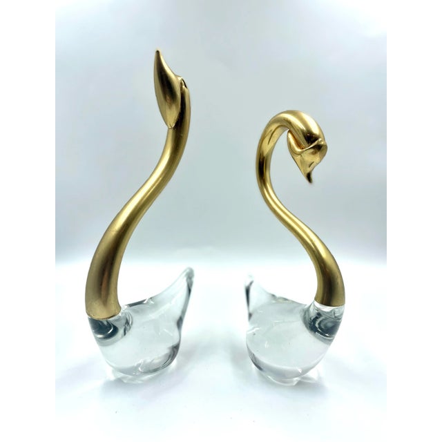 "Swans A Swimming!" This stunningly glamorous pair of Mid-Century Modern hand blown clear art glass swan...