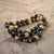 Crafted by Trifari during the 1980s, this three-strand vintage bracelet reflects dramatic Art Deco influences through a...