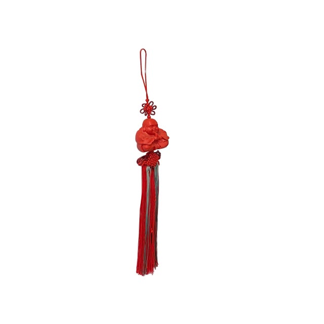 The Chinese Red Lacquer Resin Happy Buddha Figure with Knot Tassel Art is a captivating and spiritually significant piece...