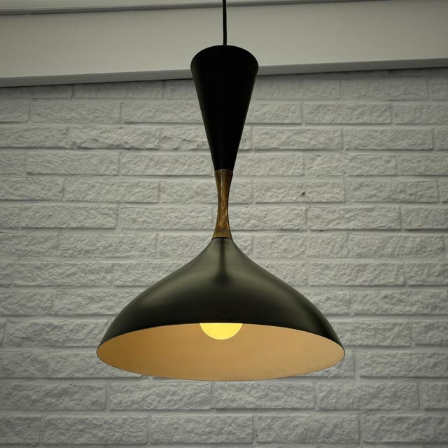 A sculptural pendant lamp, model a2827 “diabolo”, produced by the swedish manufacturer asea belysning during the 1950s....