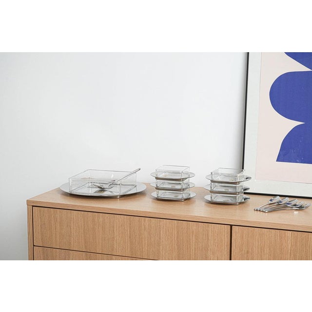 The dessert set was made in the 1970s in Italy. An original serving set consisting of 6 small plates with bowls, 1 larger...