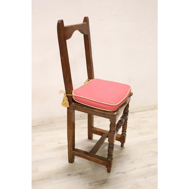 Beautiful 17th century of the period Louis XIV Italian antique rustic chair in solid walnut wood. The chair is very simple...