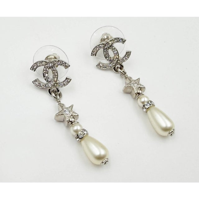 2020s Chanel Brand New Silver CC Crystal Star Tear Drop Pearl Piercing Earrings, A Pair For Sale - Image 5 of 6