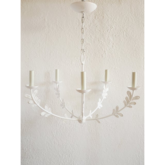 The Florian Chandelier from Troy Lighting in a Gesso white finish draws inspiration from natural forms, turning aluminum...