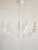 The Florian Chandelier from Troy Lighting in a Gesso white finish draws inspiration from natural forms, turning aluminum...