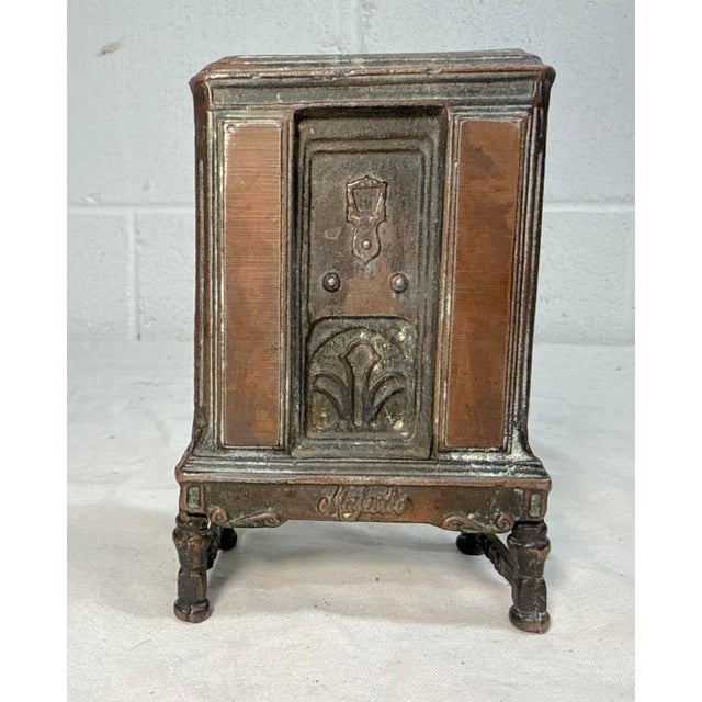 Up for sale is a lovely antique Arcade bronze patinated cast iron Majestic radio still bank from the 1930s by Grigsby-...