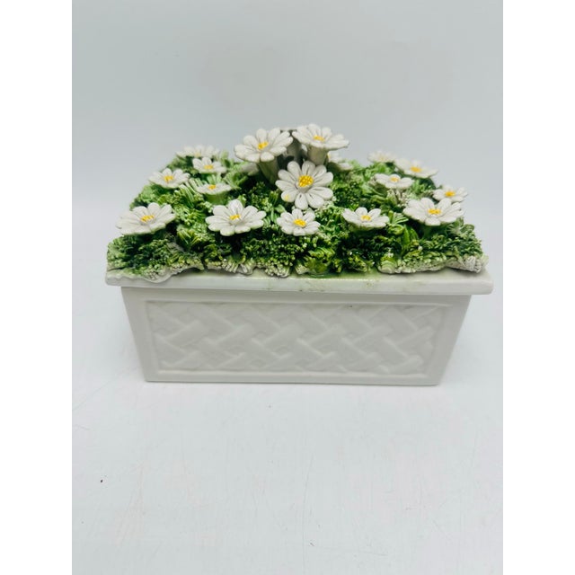 This delightful piece is a vintage Italian ceramic floral trinket box, hand-crafted and marked “Italy” on the base — a...