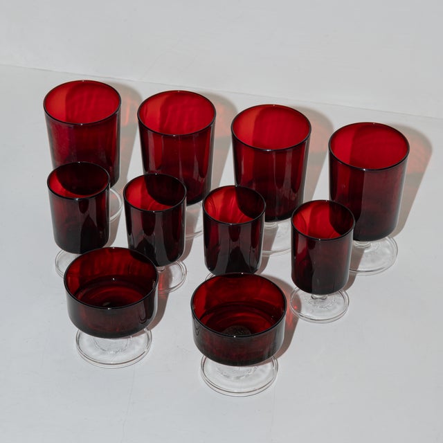 French mid-century design, Cavalier Ruby red by Cristal D'Arques-Durand, Luminarc. Four wine glasses, four cordial...