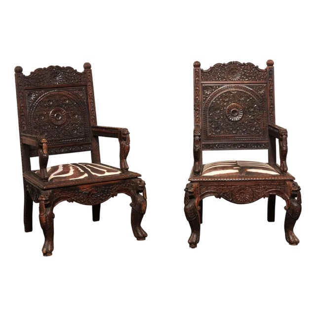 Mid 20th Century Elaborately-Carved Armchairs with Zebra-printed Seats For Sale