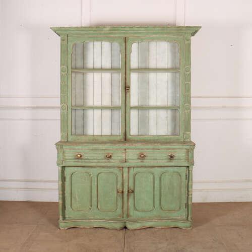 Unusual 19th century English west country painted glazed pine kitchen dresser. 1840. This piece is designed in the style...