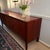 A timeless Danish Mid-Century Modern rosewood sideboard, showcasing the clean lines, exceptional craftsmanship, and...