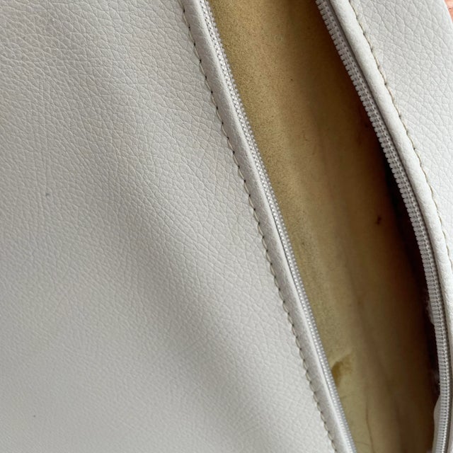 Togo pouf by michel ducaroy for ligne roset. Reupholstered here in pink fabric. Its original cover will be delivered with...