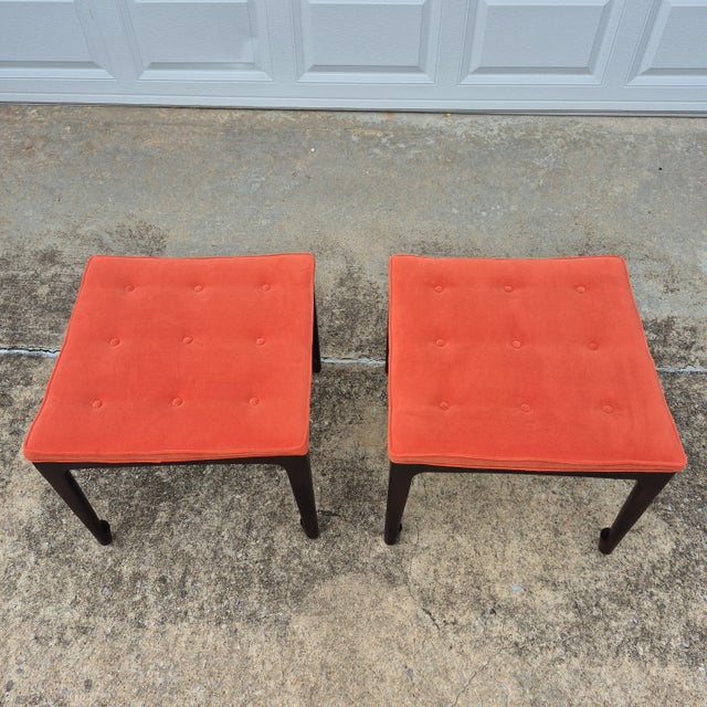 This beautiful pair of matching foot stools is a sleek modern take on the Egyptian Revival Thebes stool by Thomas O'Brien...