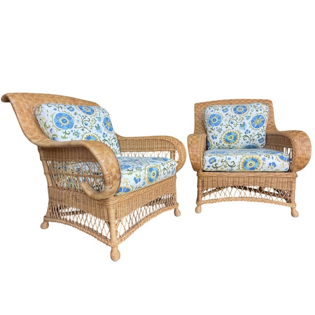 Comfortable, substantial pair of woven rattan lounge chairs by Henry Link. The frames have a beautiful sculptural shape...