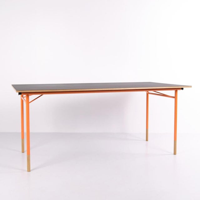 Nyhavn Dining table designed by Finn Juhl in 1953 and produced by House of Finn Juhl in 2015. The tabletop is finished in...