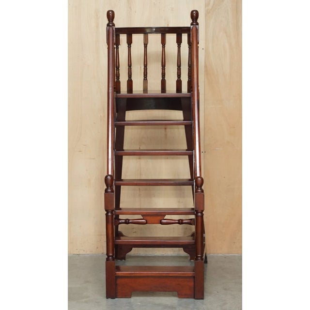 A spectacular and imposing tall antique Georgian style library steps crafted from premium solid mahogany wood. Standing at...